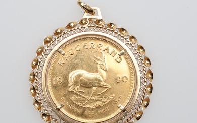 PENDANT WITH GOLD COIN, 1 oz fine gold, Krugerrand, South Africa, 1980 gold 18/22K weight approx 42,7 gram.