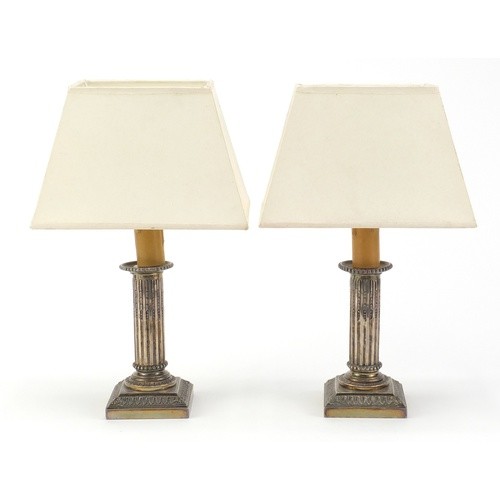 Pair of Chinese silver table lamps with shades, impressed ch...