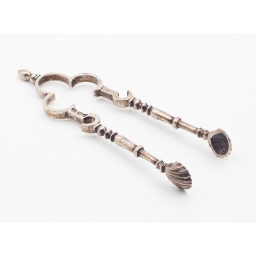 Pair of Sugar Tongs with Scallop Motif Wells
