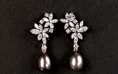 Pair of exclusive diamond-pearl earrings, 950 platinum (hallmarked), total weight 10.24g, upper par
