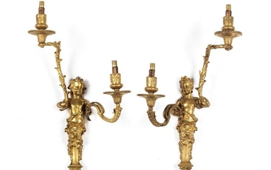 Pair of figurative wall appliques