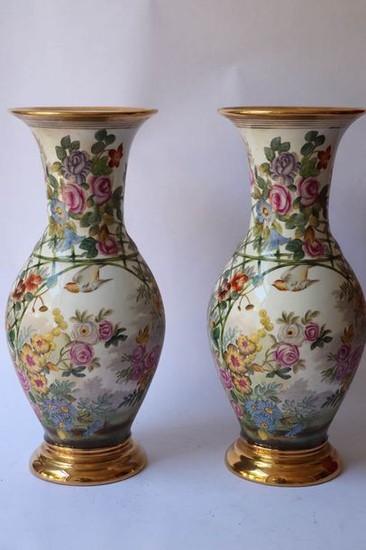 Pair of painted porcelain vases with polychrome decoration...
