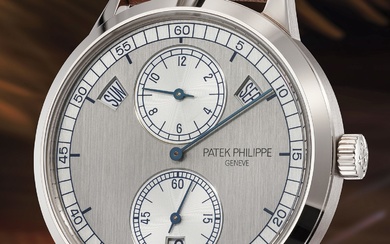 Patek Philippe, Ref. 5235G-001 A fine, attractive and well-preserved white gold annual calendar wristwatch with small seconds, two-tone silvered regulator dial, certificate of origin and presentation box