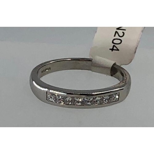Platinum half eternity ring with 0.60ct diamonds princess cu...