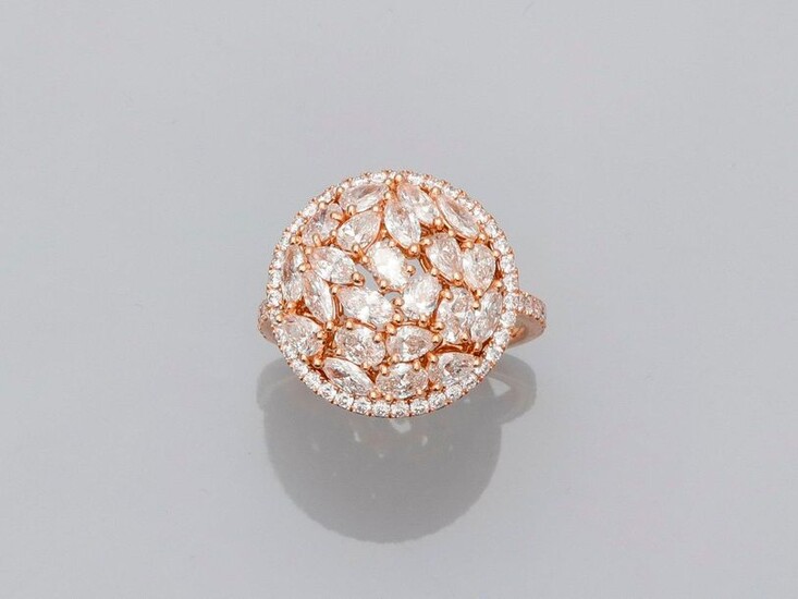 Round ring in pink gold, 750 MM, covered with very beautiful oval cut diamonds, shuttle, pear all in a row of brilliant-cut diamonds and between two lines of brilliants on the body of the ring, total about 2.40 carats, diameter 18 mm, height 5 mm...