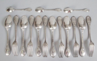 SIX TABLE COVERS and three small silver spoons, 950 thousandths, decorated with palmettes, laurel wreaths and caduceus. Goldsmith: L.G. Weight : 1.041 kg