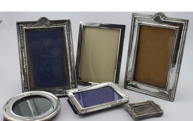 Six silver mounted photo frames, five bear older British hal...