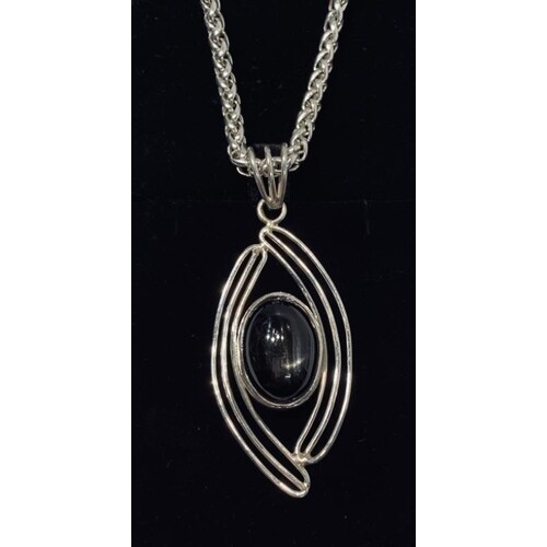 Sterling Silver Black Star Sapphire of exceptional quality o...