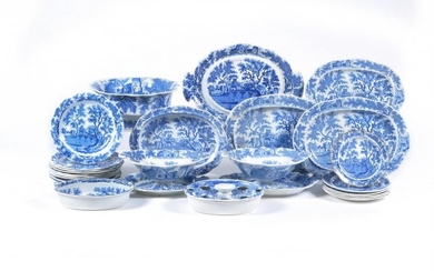 The remnants of a Henshall & Co. blue and white printed pearlware 'Castle & Bridge' pattern dinner service