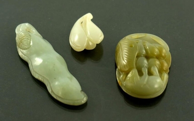 Three Chinese carved jade pendants, mode