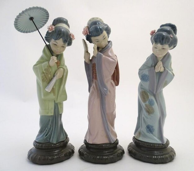 Three Lladro figures modelled as Japanese geisha girls