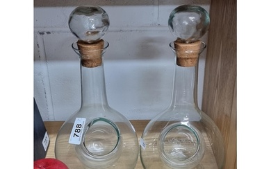 Two antique fabulous hand blown glass decanters with cork st...