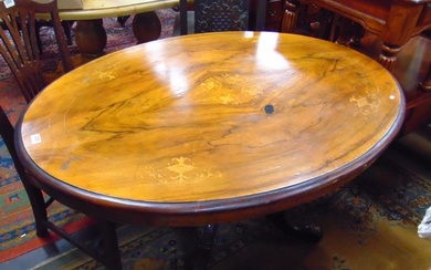 Victorian inlaid walnut loo table, oval fold over top, on qu...