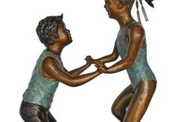 Young Boy and girl dancing around fountain bronze