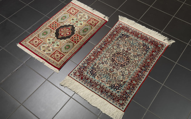 two small hand knotted rugs in silk amon
