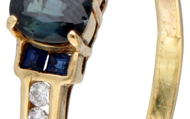 14K. Yellow gold ring set with natural sapphire and zirconia.