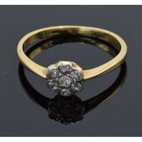 18ct gold daisy ring set with diamonds. UK size O. 2.1 grams...