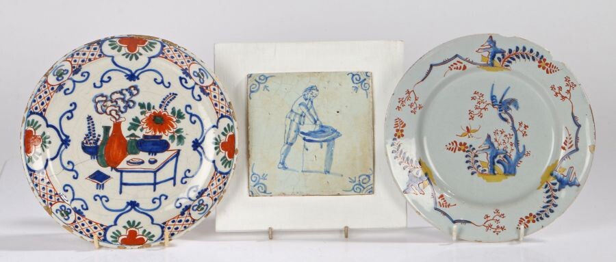 18th Century Delft pottery, to include a polychrome plate with bird in a tree and confirming border