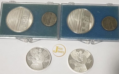 4 silver coins - and pins attached to silver coins...