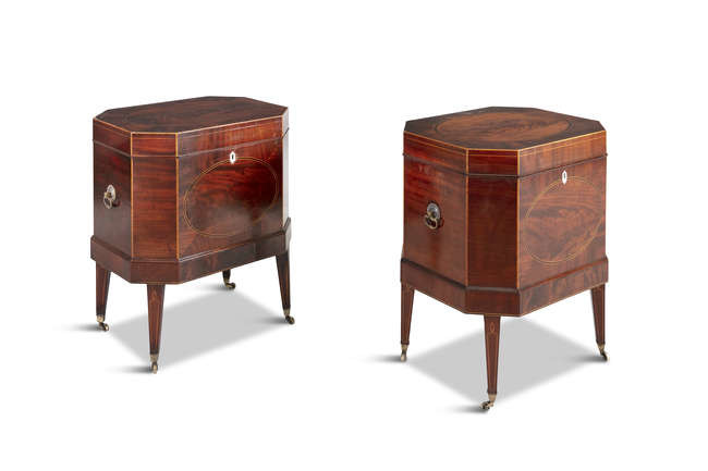 A PAIR OF GEORGE III MAHOGANY CELLARETTES, of...
