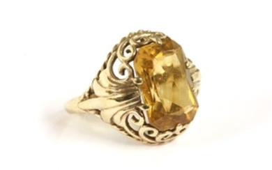 A 9ct gold single stone scissor cut citrine ring