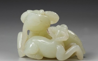 A jade carving of two ox