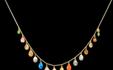 A necklace of sixteen jewelled, enamelled, hardstone miniature eggs