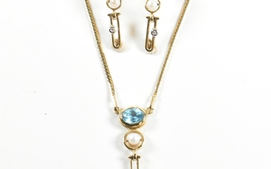 A 14ct gold, topaz, diamond and cultured pearl pendant neckl...