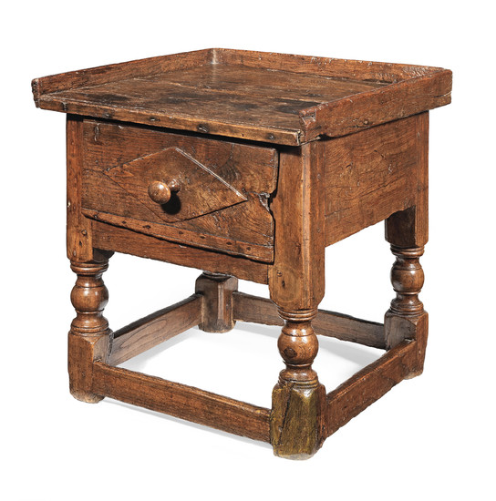 A 17th century small joined chestnut occasional table, Spanish