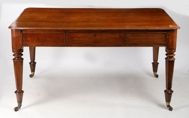 A 19TH CENTURY OAK LIBRARY TABLE.