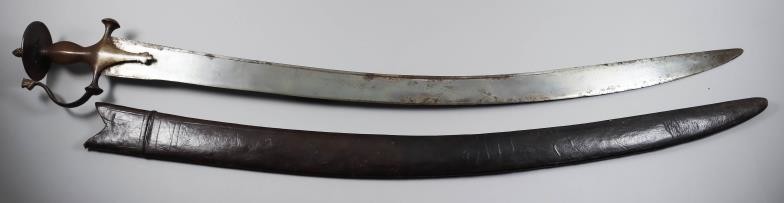 A 19th Century Indian Talwar, the 31ins steel blade...