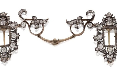 A 19th century diamond necklace fitting, comprising two old-brilliant-cut diamond panels with central stones deficient, each with detachable brooch fitting, with diamond articulated scroll panel connecting links (VAT charged on hammer price)