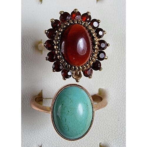A 9ct rose gold turquoise ring, size R and a 9ct gold garnet...