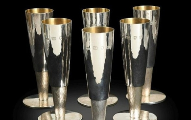 § A set of six Elizabeth II silver champagne flutes by Gerald Benney CBE (1930-2008)