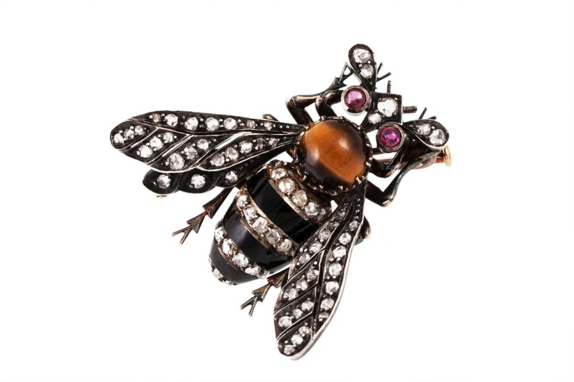 A BEE BROOCH, the diamond, ruby and enamel body mounted in g...