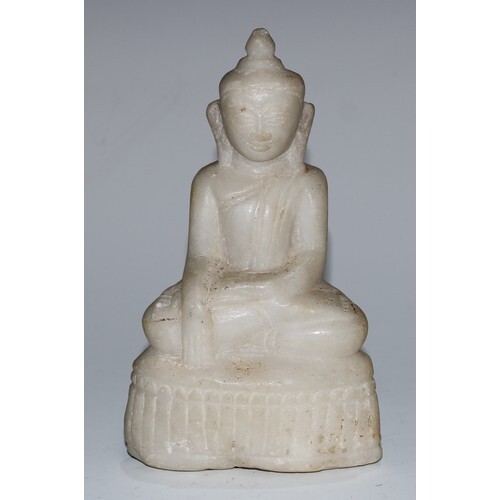 A Burmese marble Buddha, seated in Bhumisparsha mudra, lotus...