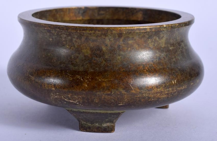 A CHINESE BRONZE CENSER, signed. 8 cm wide.