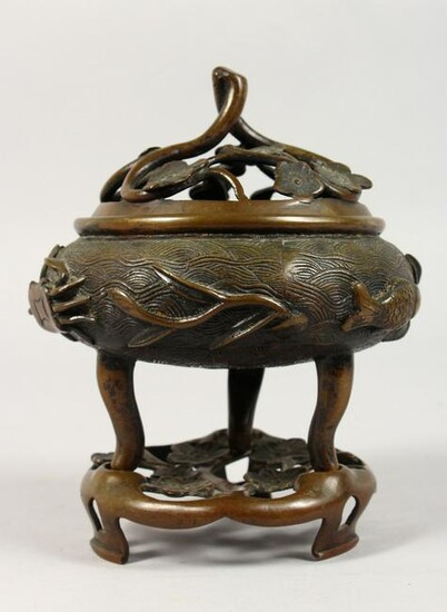 A CHINESE CIRCULAR BRONZE CENSER ON A STAND. 7ins