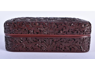 A CHINESE QING DYNASTY CARVED CINNABAR LACQUER BOX AND COVER...