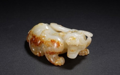 A CHINESE WHITE AND RUSSET JADE BIXIE