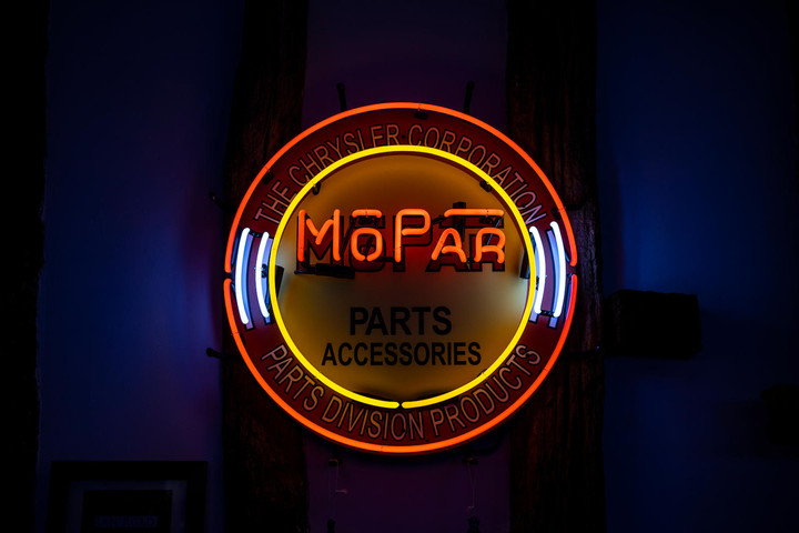 A Chrysler Corporation MoPar parts and accessories neon sign