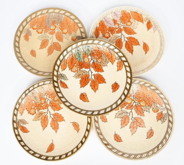 A Crown Ducal Golden Leaves wall charger designed...