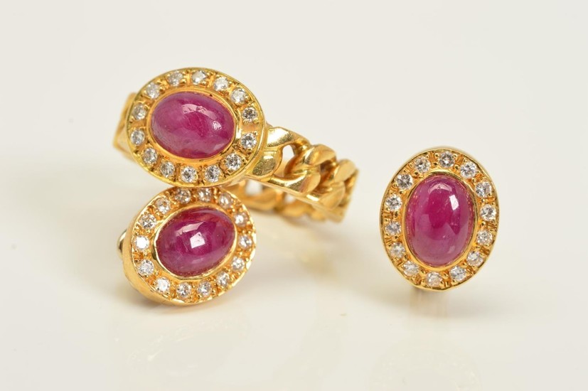 A DIAMOND AND RUBY RING AND EARRINGS SET, the ring designed ...