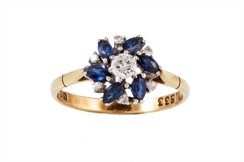 A DIAMOND AND SAPPHIRE CLUSTER RING, with diamonds of approx...