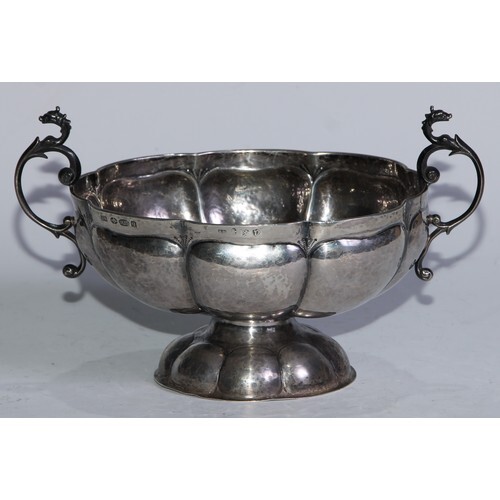 A Dutch silver lobed oval pedestal brandy bowl, leafy scroll...