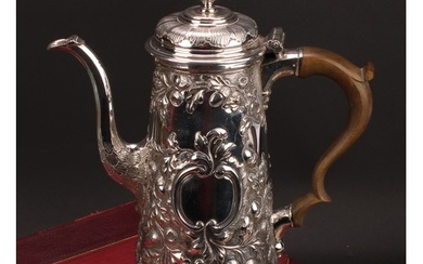 A George II silver spreading cylindrical chocolate pot, hing...