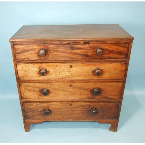 A Georgian mahogany chest of four long drawers, on bracket f...