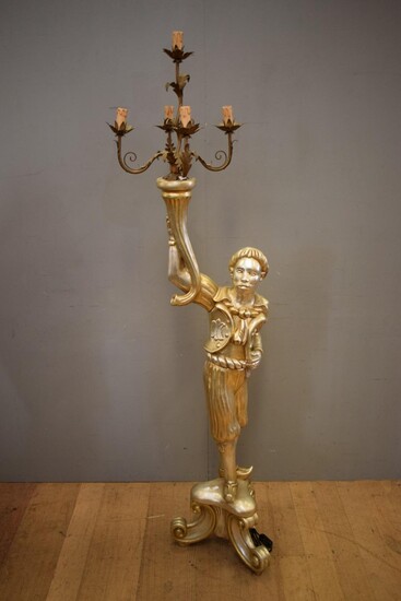 A LARGE 1920S CARVED ITALIAN GILTWOOD FIGURAL LAMP OF A BOY HOLDING A CORNUCOPIA (NEEDS REWIRING) (188 CM H)