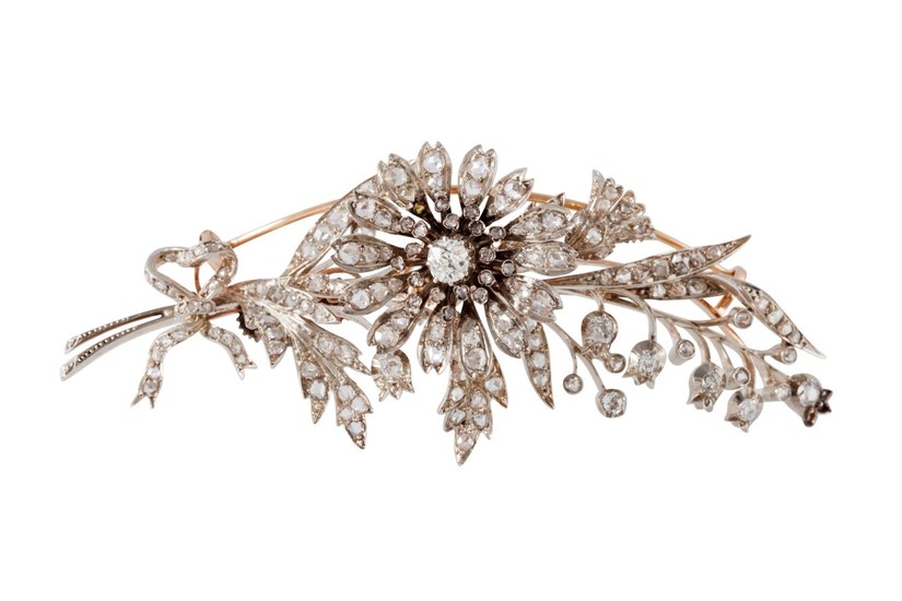A LATE VICTORIAN FLORAL DIAMOND BROOCH, 'en tremblant', in f...