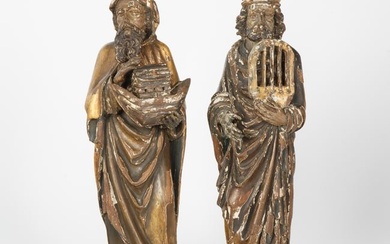A PAIR OF 15TH CENTURY ITALIAN CARVED AND PAINTED WOOD SAINTS
